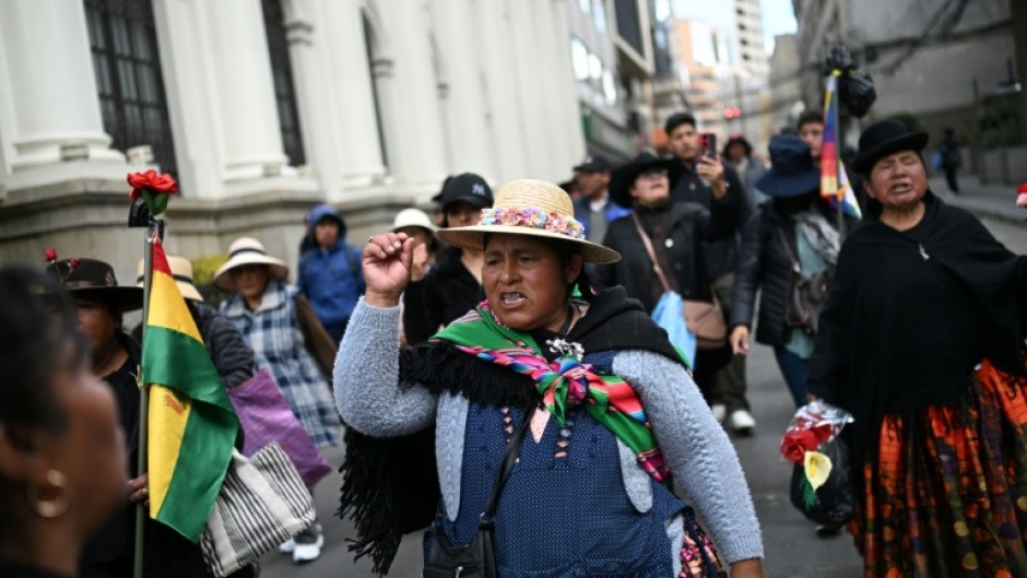 Indigenous women take part in a protest against the government of Bolivian President Rodrigo Paz