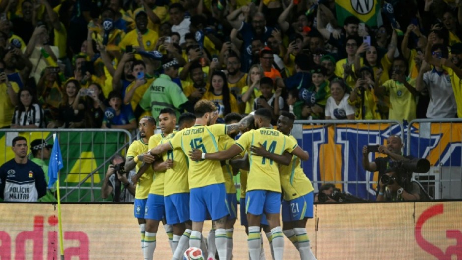 Brazil's players celebrate Vinicius Jr's opening goal in a 6-2 thrashing of Panama at the Maracana Stadium