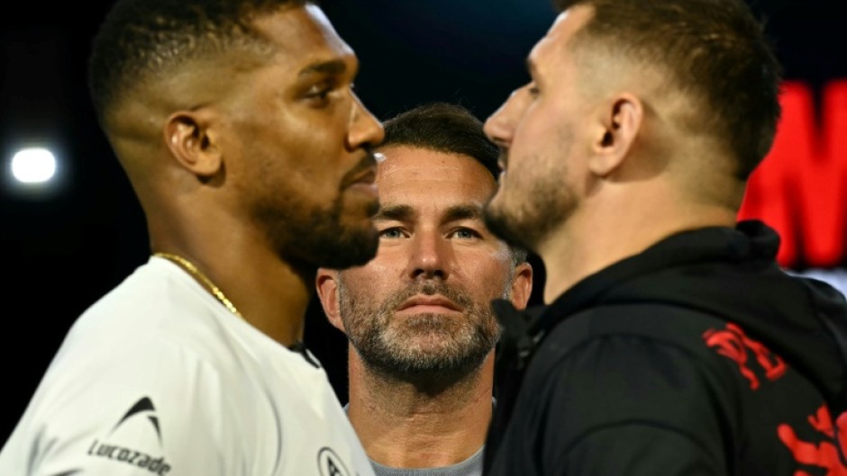 Anthony Joshua will take on Albania's Kristian Prenga (R) next month as the Briton builds up to his fight with Tyson Fury later in the year