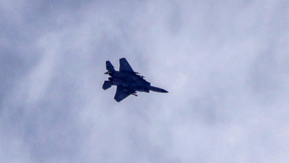 An Israeli fighter jet flies over the southern Lebanese area of Marjayoun on June 3