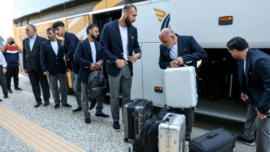The latest exchange of fire came as the United States refused to grant visas to some staffers of Iran's World Cup football team