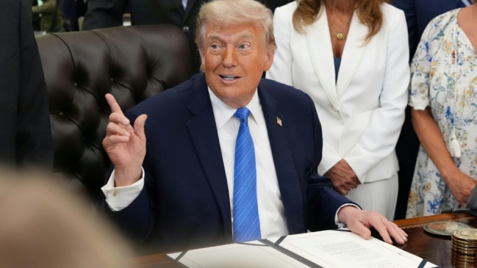 US President Donald Trump speaks during a signing ceremony for the "Secure America Act" in the Oval Office of the White House