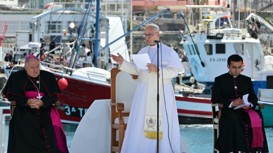 Pope Leo XIV delivers a speech during a meeting with organizations working with migrants in the port of Arguineguin on the Canary Island of Gran Canaria, a place accustomed to the arrival of migrants