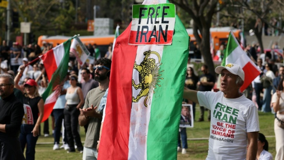 The Lion and Sun flag has already been seen in Los Angeles this year, and protesters say they will be displaying it again at Iran's World Cup opener against New Zealand