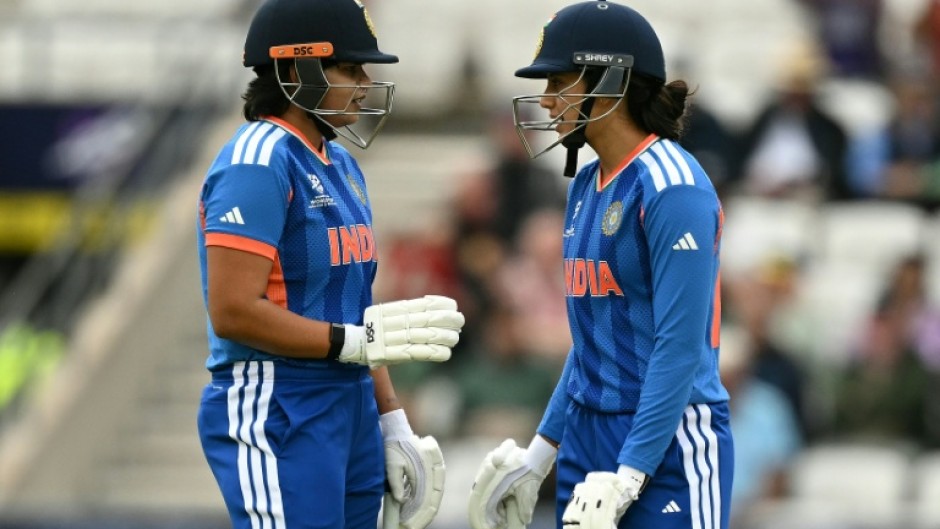 India's Shafali Verma (L) and Smriti Mandhana (R)