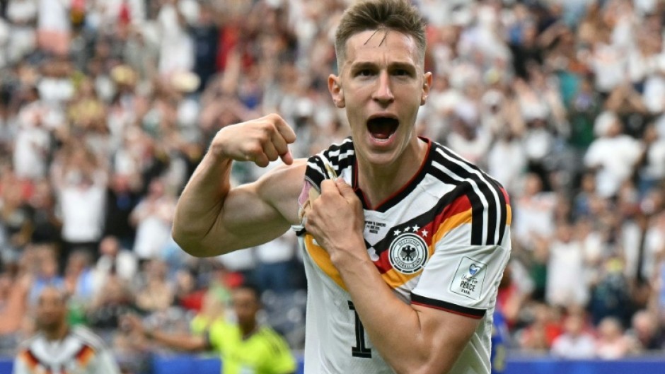 Nico Schlotterbeck celebrates after scoring against Curacao at the World Cup