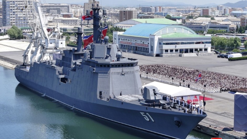 This picture released by North Korea's official KCNA news agency shows a commissioning ceremony of the new destroyer Choe Hyon at Nampo port