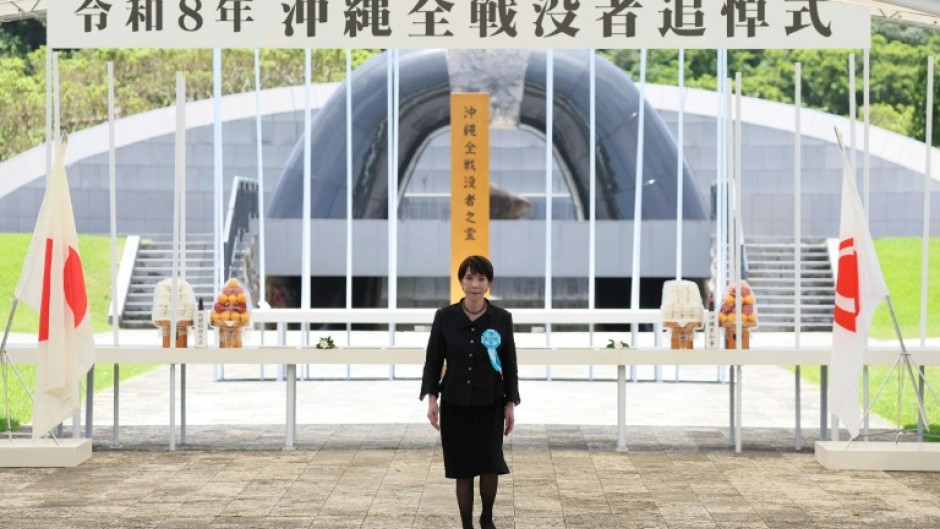 Japan's Prime Minister Sanae Takaichi walks away from the Peace Park Memorial after laying flowers for All War Dead, marking 81 years since the end of the Battle of Okinawa during World War Two