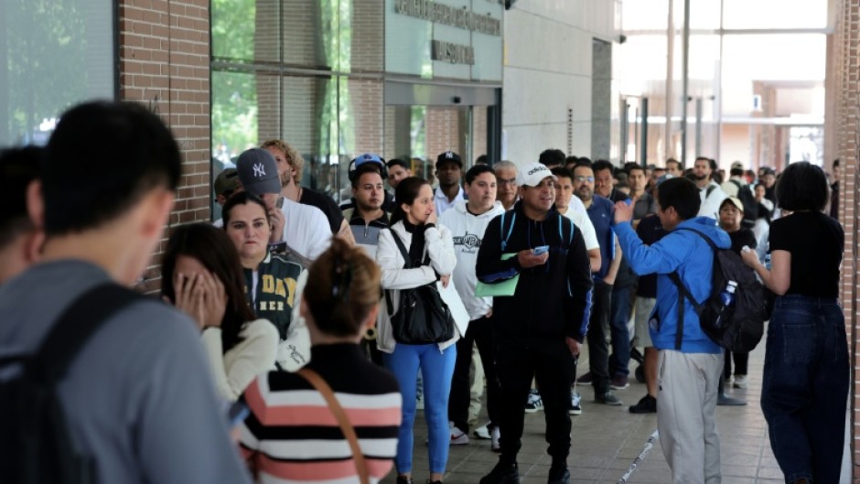 Men, women and children have queued in the streets to obtain documents and attend appointments for their regularisation