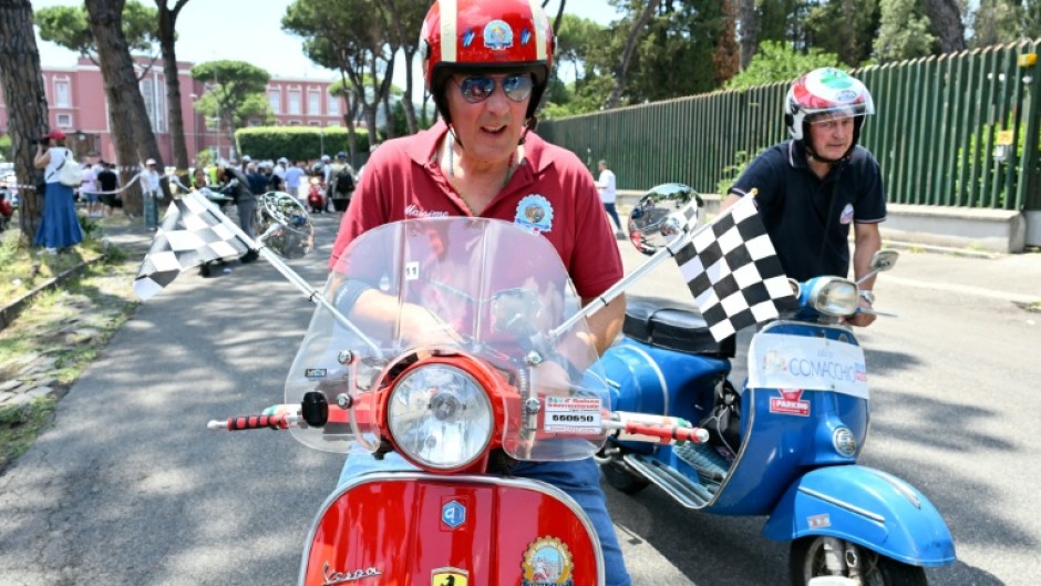 Vespa aficionados converged on Rome for a colourful if noisy zip around the streets of the Italian capital