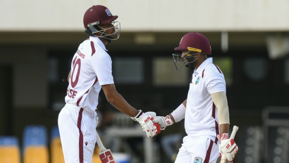 Amir Jangoo (R) will resume on the third morning on 78 in partnership with Roston Chase (L), who is 42 not out