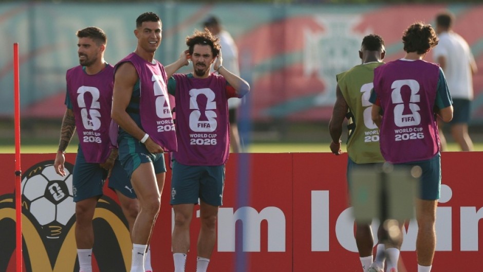 Portugal's players prepare for their crucial Group K decider with Colombia