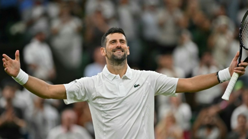 Serbia's Novak Djokovic celebrates beating China's Wu Yibing.