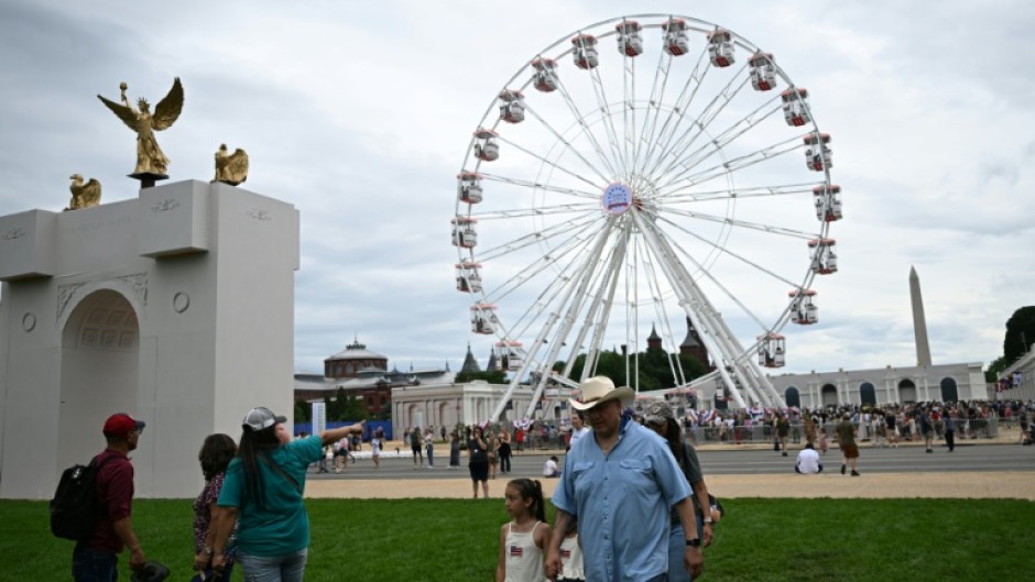 People attend the “Great American State Fair" on the National Mall in Washington, DC, on June 27, 2026