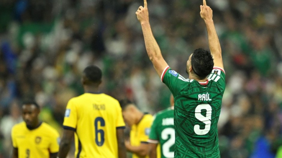 Mexico forward Raul Jimenez celebrates scoring against Ecuador in the World Cup round of 32 at the Azteca Stadium