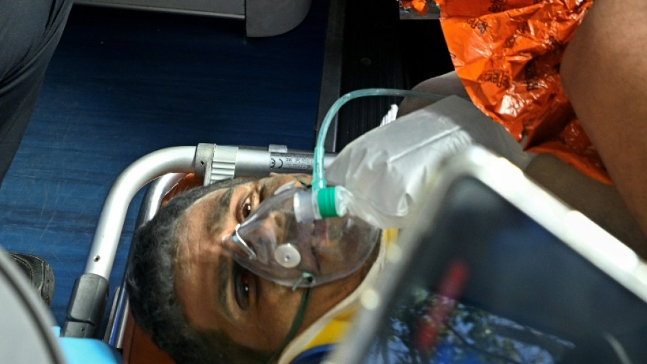The rescue of security guard Hernan Gil after so long under the rubble was greeted as a miracle