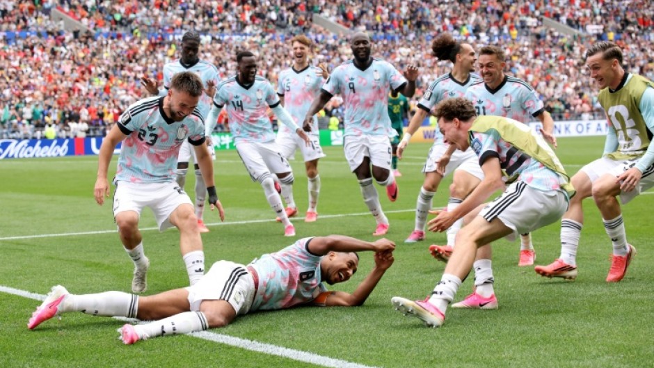 Youri Tielemans (C) celebrates his late winner for Belgium against Senegal