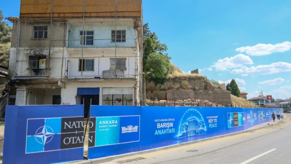 Hundreds of giant NATO billboards have been put up to hide away some of Ankara's more rundown areas