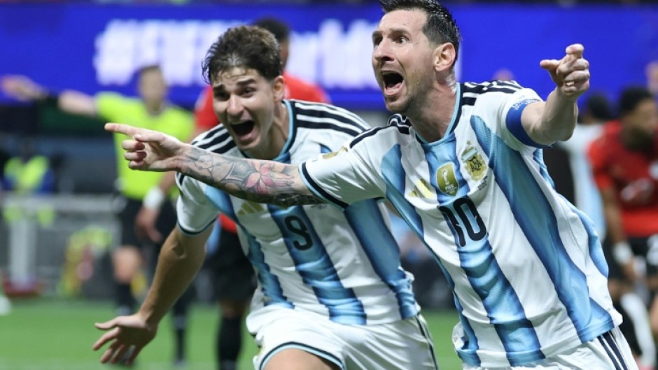 Lionel Messi celebrates scoring Argentina's second goal