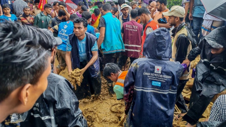 Heavy rain in Bangladesh triggered a landslide at the world's largest refugee camp that killed seven children and a teacher during a school class