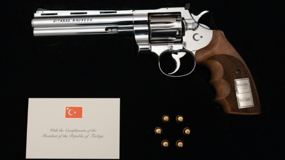 NATO leaders received the highly unusual gift of a revolver and six bullets