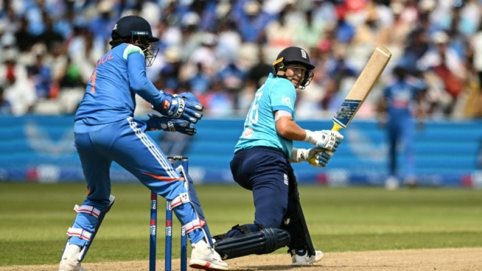 England's Joe Root (R) reverse-sweeps during his 76 not out against India in the first one-day international at Edgbaston