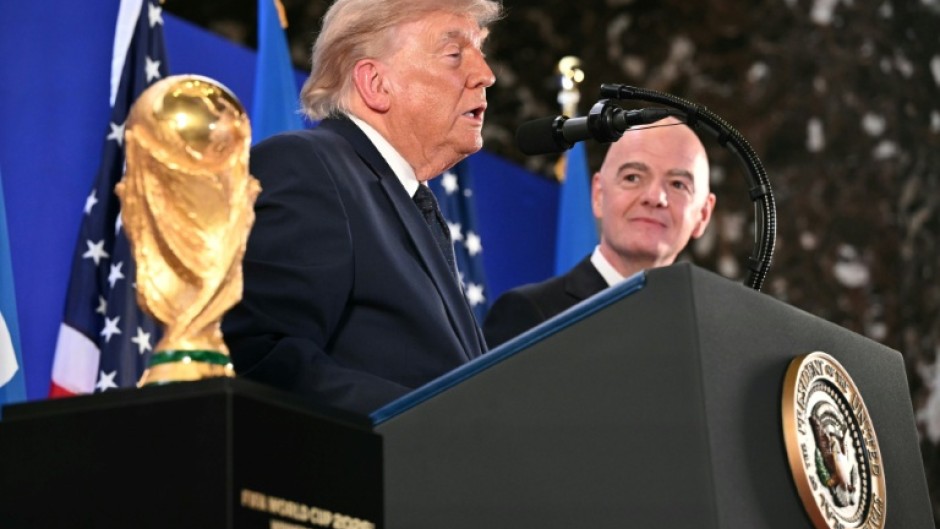 US President Donald Trump with FIFA chief Gianni Infantino at a reception at Trump Tower in New York