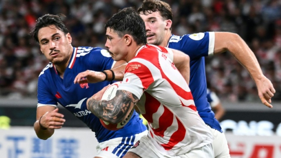 Japan's Dylan Riley makes a run against France in Tokyo during his side's 42-15 defeat