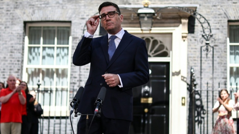Britain's new Prime Minister Andy Burnham gives his first speech in front of 10 Downing Street in central London on July 20
