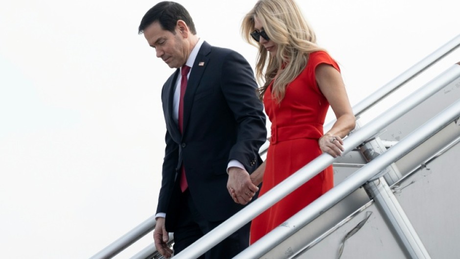 US Secretary of State Marco Rubio and his wife Jeanette Dousdebes Rubio arrive in Manila on July 21, 2026, ahead of the Association of Southeast Asian Nations (ASEAN) Foreign Ministers' Meeting