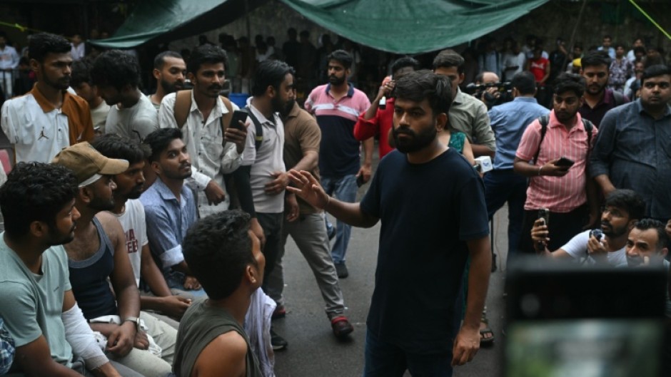 Cockroach Janta Party (CJP) founder Abhijeet Dipke speaks to people in New Delhi on July 21, 2026