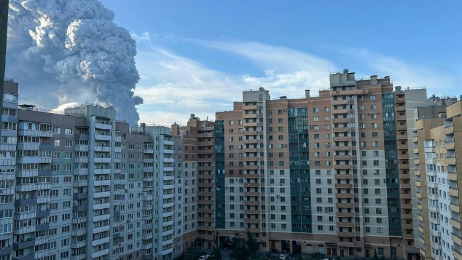 Smoke rises into the sky over residential buildings in Saint Petersburg on July 24, 2026