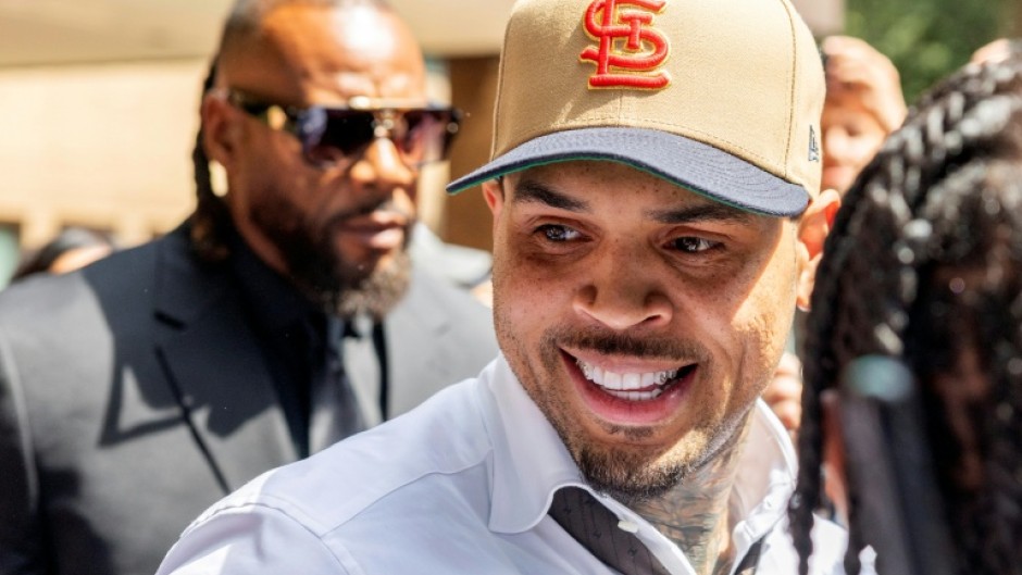 US singer Chris Brown leaves a UK court after pleading guilty to affray during a 2023 London nightclub brawl