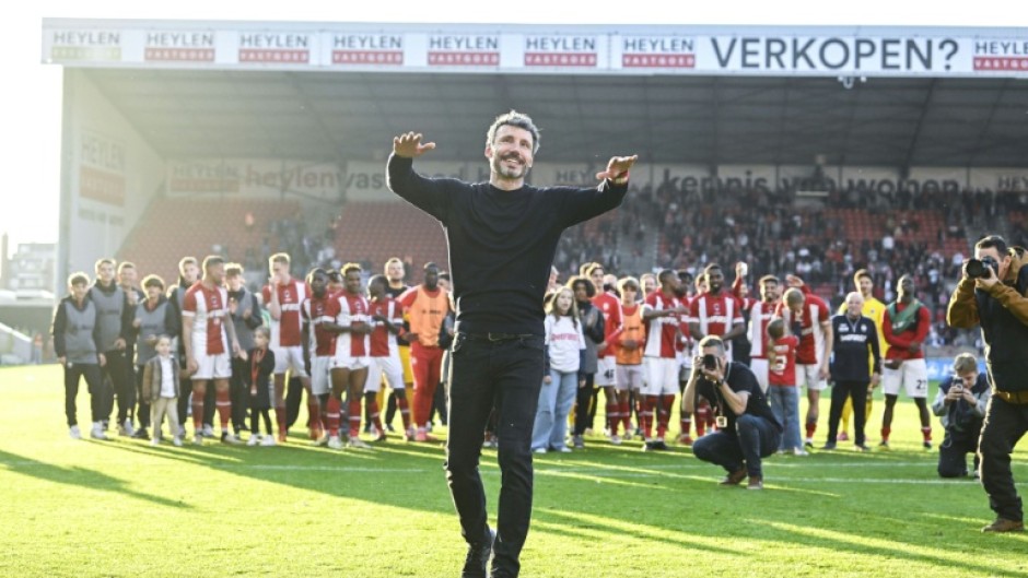Mark van Bommel (C) is the new coach of the Belgium national football team