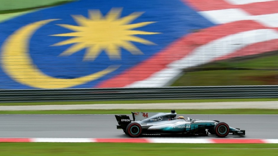 Lewis Hamilton races at the 2017 Malaysian Grand Prix while driving for Mercedes