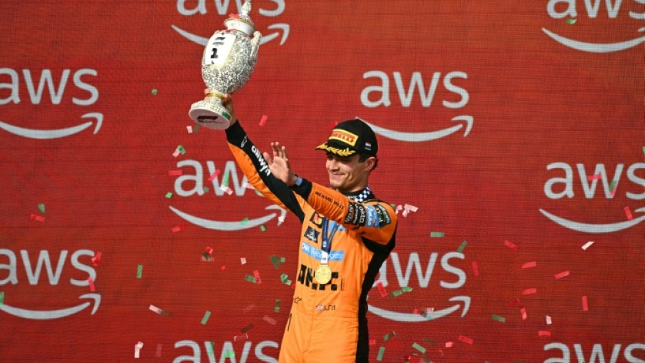 Lando Norris celebrates his first grand prix win of the season in Hungary