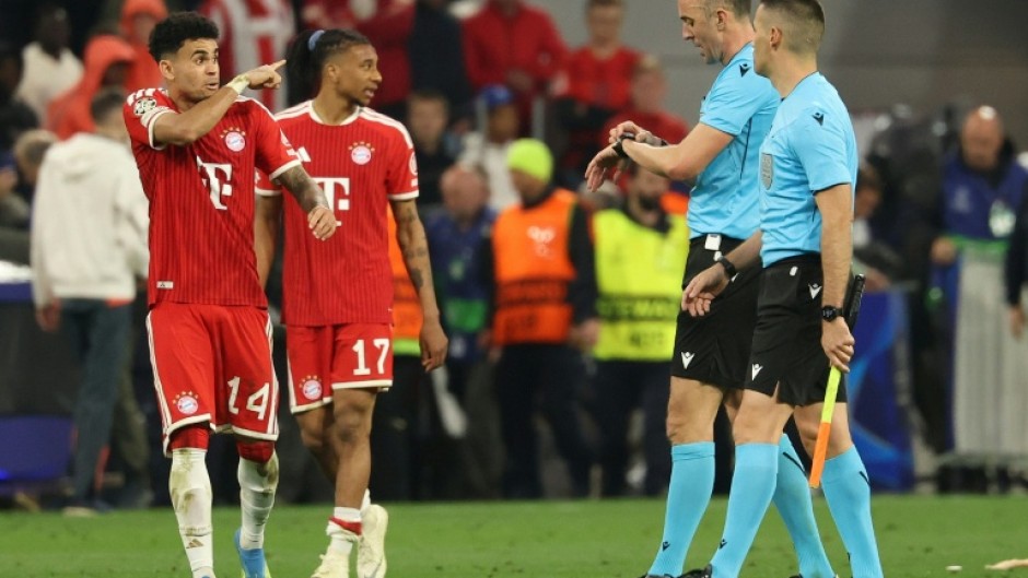 Bayern Munich wingers Luis Diaz (L) and Michael Olise are highly sought after in the summer transfer market.