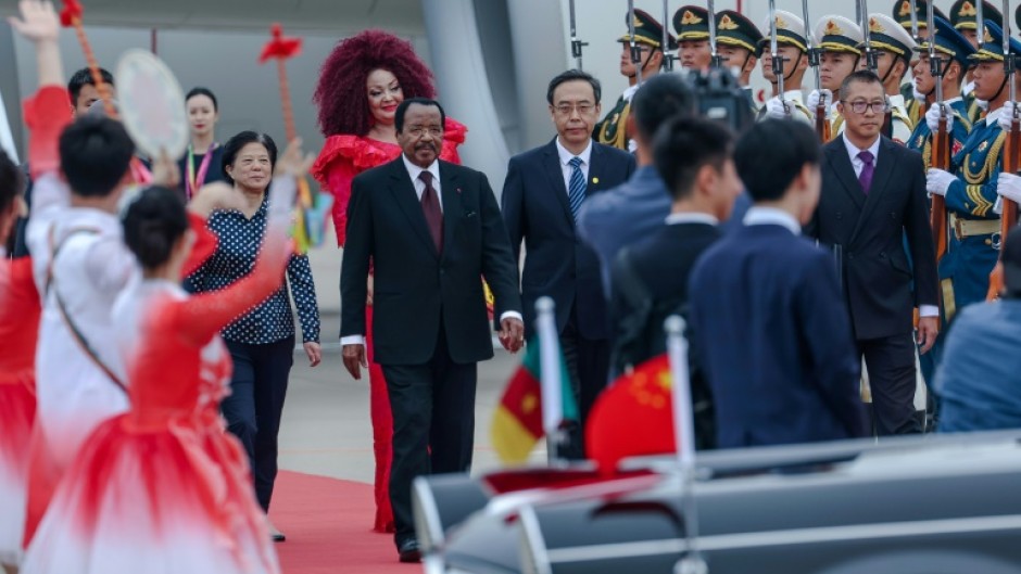 One of Biya's (C) last official trips was to China in September 2024, though his public appearances had become increasingly rare
