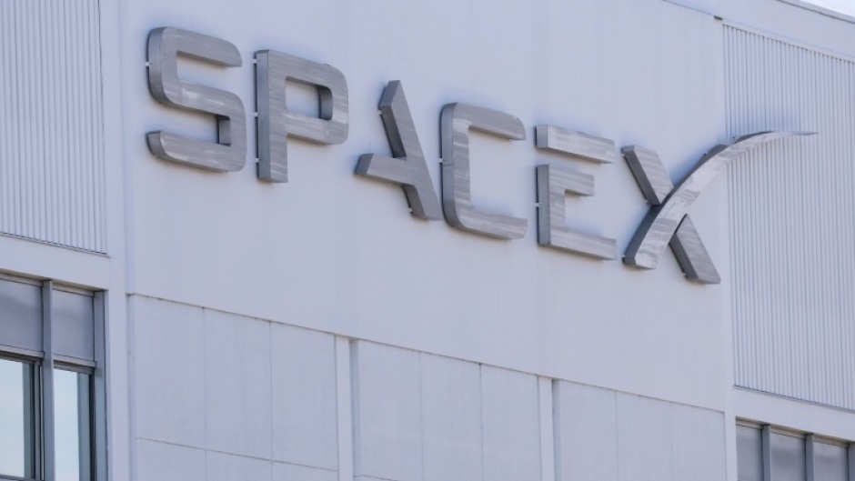 SpaceX signage is displayed outside a Space Exploration Technologies Corp. facility in Hawthorne, California in March 2026