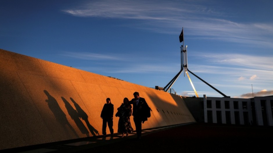 Australia politician admits texting 'my job is boring' during meeting ...