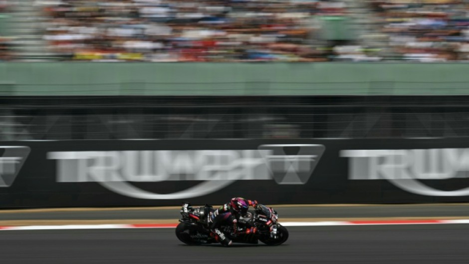Aprilia Racing's Spanish rider Jorge Martin set a new lap record on his way to pole position for the MotoGP British Grand Prix at Silverstone