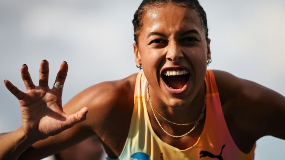 Switzerland's Audrey Werro celebrates after winning the 800m at the Paris Diamond League