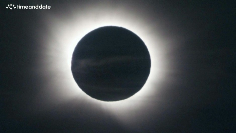 Images show moment of rare total solar eclipse in Palma de Mallorca, Spain