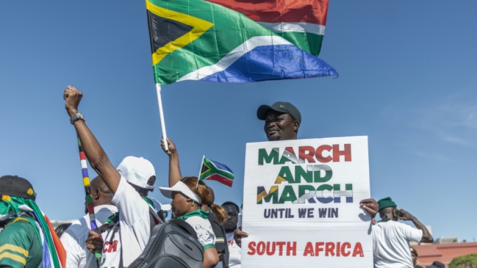 Anti-migrant protesters gathered outside the venue of a southern Africa regional summit