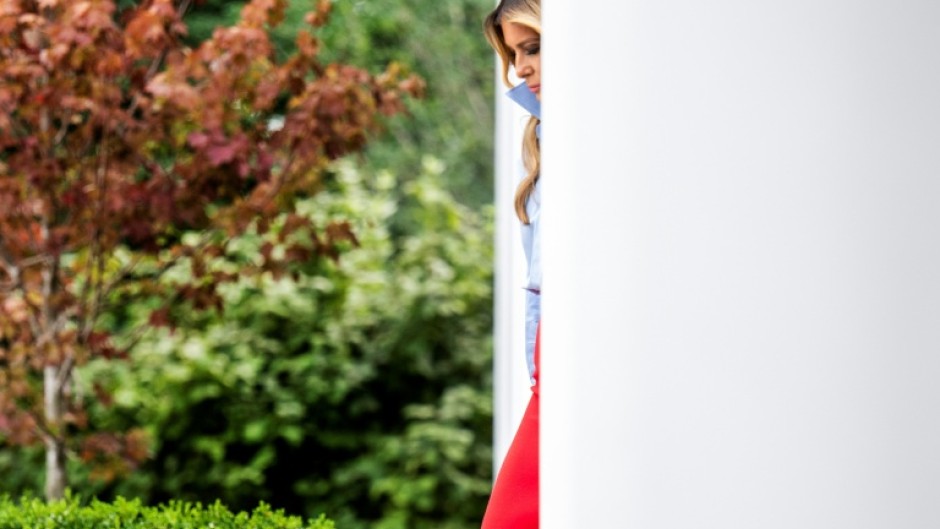 US First Lady Melania Trump arrives to host an event in the Rose Garden of the White House, in Washington, DC, on August 20, 2026, her first public appearance in a month