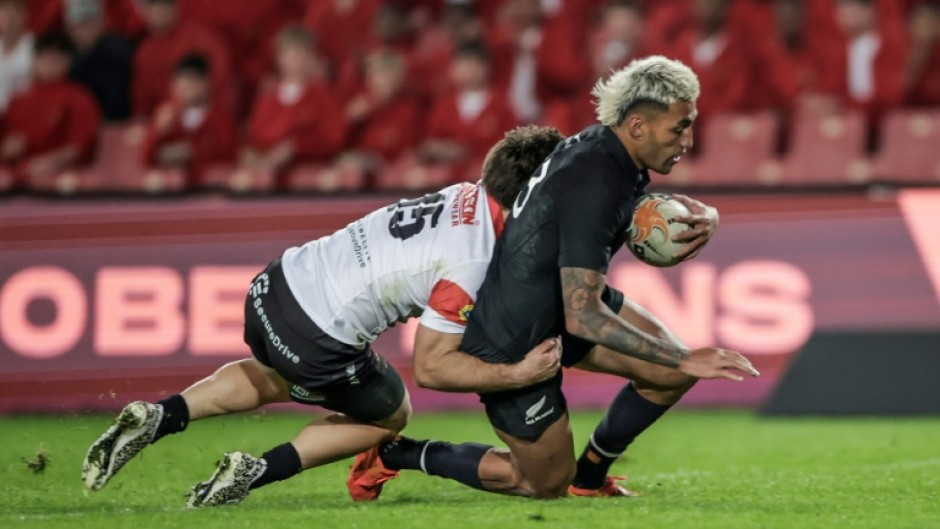 New Zealand trailed 35-17 after 49 minutes when centre Rieko Ioane (R) scored his first try