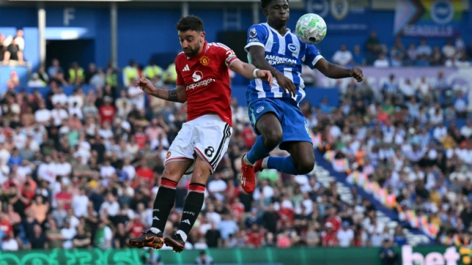 Carlos Baleba (R), playing against Manchester United in May, said the move to the Premier League giants was a 'dream'