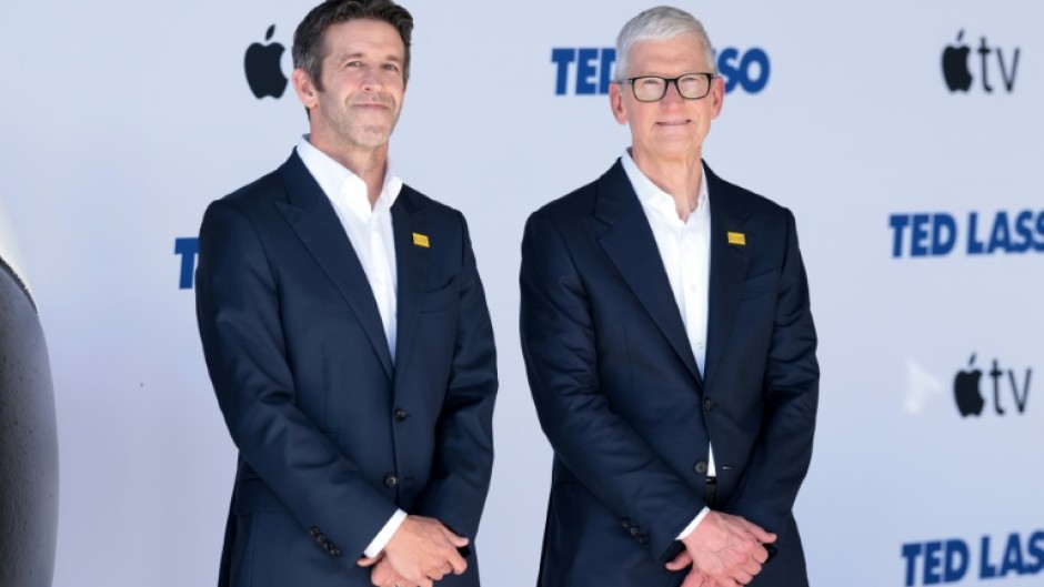 John Ternus (left), takes over as Apple chief executive, with Tim Cook (right) becoming executive chairman
