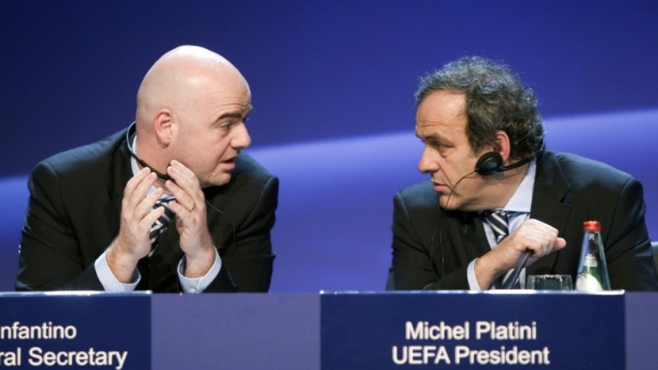 When Michel Platini (R) was UEFA president, Gianni Infantino (L) was his general secretary