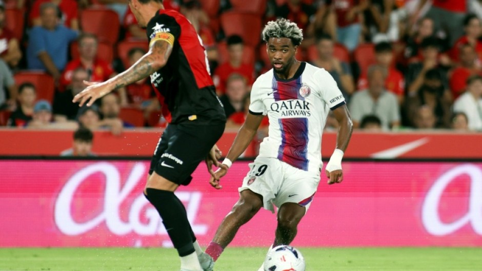 Paris Saint-Germain's Ibrahim Mbaye (R) has joined Aston Villa